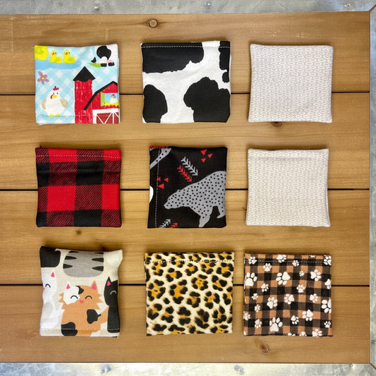 Handmade valerian bean bag cat toys in assorted fabric patterns for feline enrichment and comfort