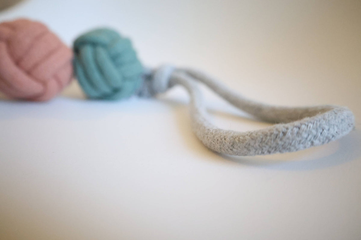 Close-up of durable rope handle on Handmade Ice Cream Rope Ball Dog Toy