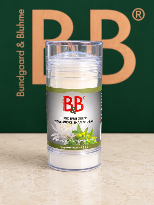 B&B Chrysanthemum & Jojoba Shampoo Bar for dogs in twist-up container.
