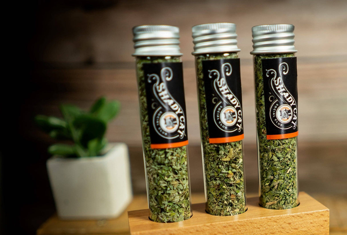 Three tubes of Shady Cat organic catnip and silver vine blend standing upright