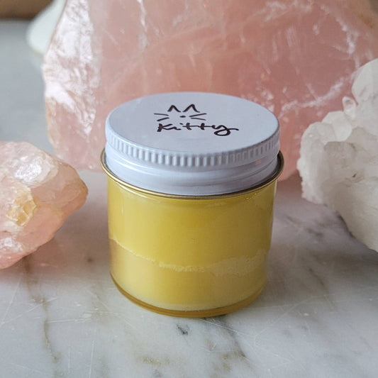 Healing Green Salve for Kitties in a 1 oz amber glass jar made with organic herbal ingredients.