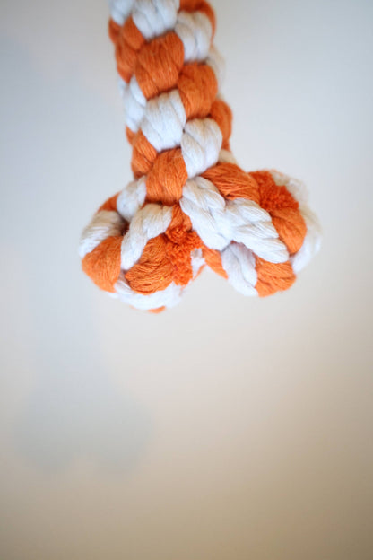 Close-up of the knotted end of a handmade rope bone dog toy