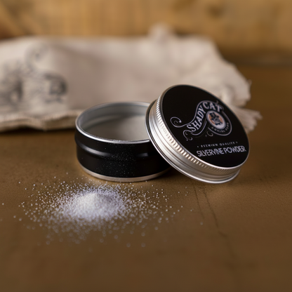 Open tin of organic silver vine powder with a light sprinkle
