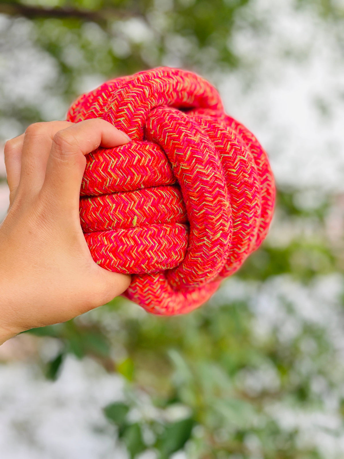 Close-up of Handmade Jumbo Rope Ball Dog Toy highlighting handcrafted design