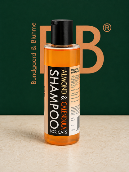 Side view of B&B Organic Cat Shampoo bottle showing Almond & Marigold product labeling