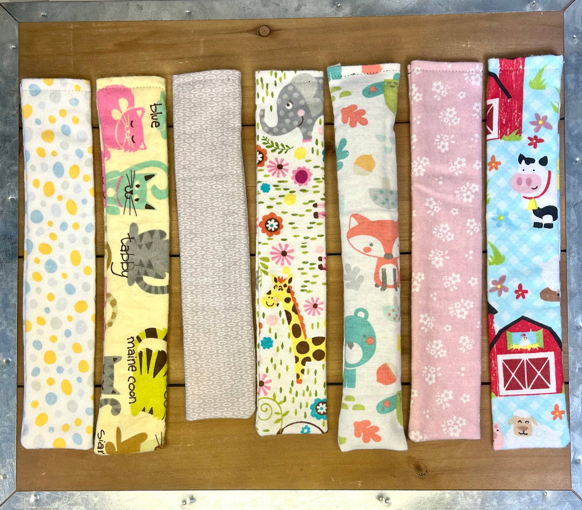 Colorful handmade valerian cat cuddlers in assorted one-of-a-kind fabrics