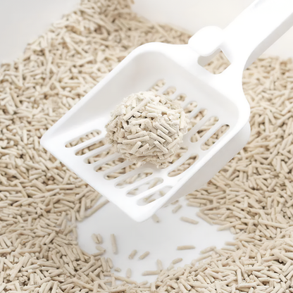 Cat litter scoop filled with SoyKitty pellets
